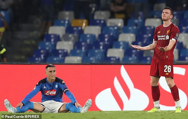 Andy Robertson lets out a cry of anguish after giving away a penalty against Napoli with eight minutes of the game to go in Liverpool's Champions League clash on Tuesday night