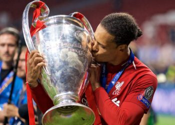 MADRID, SPAIN - SATURDAY, JUNE 1, 2019: Liverpool's Virgil van Dijk kisses the trophy after the UEFA Champions League Final match between Tottenham Hotspur FC and Liverpool FC at the Estadio Metropolitano. Liverpool won 2-0 to win their sixth European Cup. (Pic by David Rawcliffe/Propaganda)