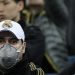 Real Madrid fans wear masks at a recent game at the Bernabeu (Image credit: Getty Images)