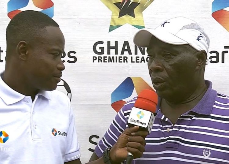 Great Olympics coach, Annor Walker (right) speaking to Eli Kondoh of StarTimes