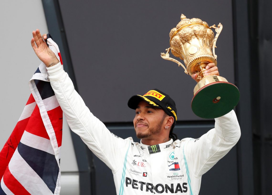 Lewis Hamilton wins British Grand Prix after puncture on last lap