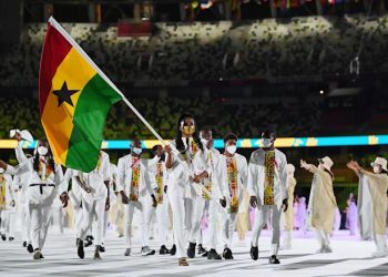 Nadia Eke leads Team Ghana out (at the Opening ceremony of the 2020 Olympics)