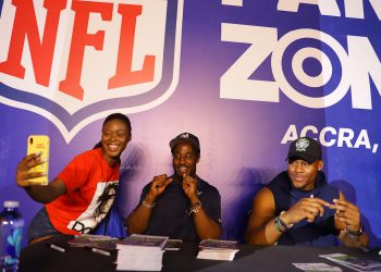 Ogbo Okoronkwo (left), Uchenna Nwosu(right) at an autograph session at the National Football League NFL fan zone event at the Kempinski Hotel on Sunday, June 26, 2022, in Ghana. (Nipah Dennis/AP Images for NFL)