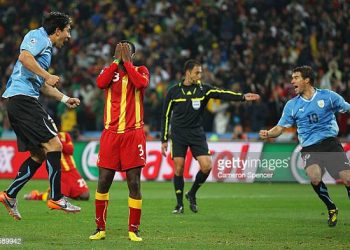 JOHANNESBURG, SOUTH AFRICA - JULY 02:  Asamoah Gyan of Ghana reacts as he misses a late penalty kick in extra time to win the match during the 2010 FIFA World Cup South Africa Quarter Final match between Uruguay and Ghana at the Soccer City stadium on July 2, 2010 in Johannesburg, South Africa.  (Photo by Cameron Spencer/Getty Images)
