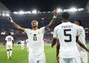 Andre Ayew celebrates scoring equalizer against Portugal