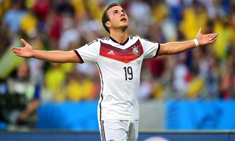Germany's Mario Gotze celebrates scoring the opening goal