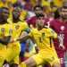 Ecuador beat host nation Qatar (red) 2-0 in the opening game