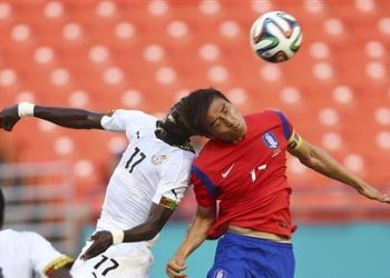 Ghana' Mohammed Rabiu (17) and South Korea's Jacheol Koo (17) fight for the ball during the first half of an international  friendly soccer match in Miami Gardens, Fla., Monday, June 9, 2014. ( AP Photo/J Pat Carter)