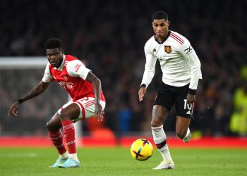 Marcus Rashford of Manchester United and Thomas Partey of Arsenal (Photo by Shaun Botterill/Getty Images)