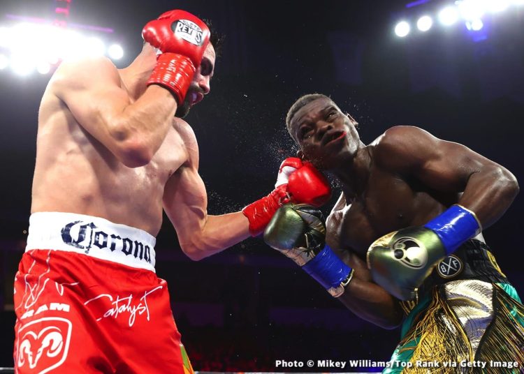 FRESNO, CALIFORNIA - MARCH 25: Jose Ramirez (L) and Richard Commey (R) exchange punches during their junior welterweight fight at Save Mart Center on March 25, 2023 in Fresno, California. (Photo by Mikey Williams/Top Rank Inc via Getty Images)
