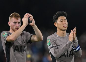 Tottenham Hotspur's Swedish midfielder #21 Dejan Kulusevski (L) and Tottenham Hotspur's South Korean striker #07 Son Heung-Min (Photo by Glyn KIRK / AFP)