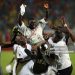 Ghana's players carry their head coach Sellas Tetteh (C) as they celebrate winning the FIFA U-20 World Cup in Cairo on October 16, 2009. Ghana overcame Brazil 4-3 on penalties in the final match, becoming the first African side to win the tournament. AFP PHOTO/KHALED DESOUKI (Photo credit should read KHALED DESOUKI/AFP via Getty Images)