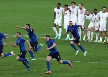 Players of Italy celebrate following victory in the penalty shoot out
England missed three of their five penalties in the final as Italy won Euro 2020