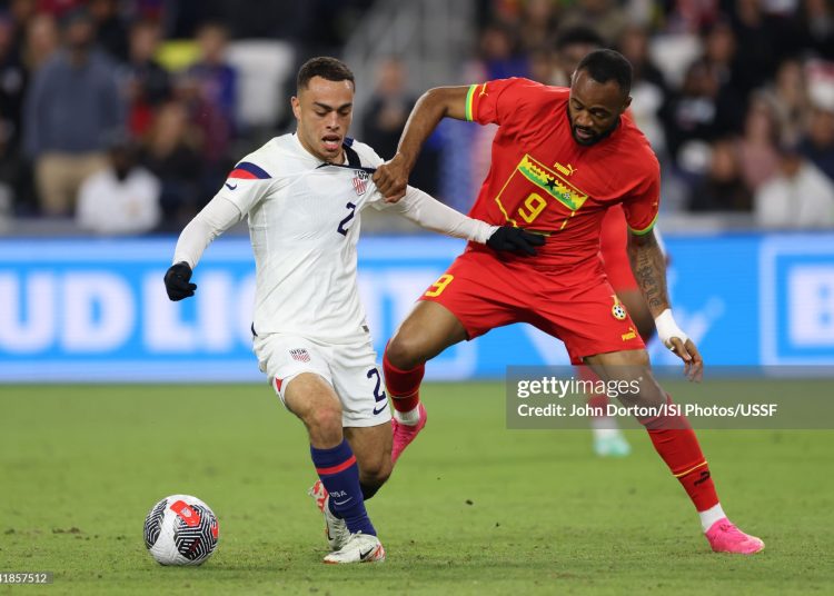 Sergiño Dest #2 of the United States battles for the ball with Jordan Ayew #9 of Ghana (Photo by John Dorton/ISI Photos/USSF/Getty Images for USSF)
