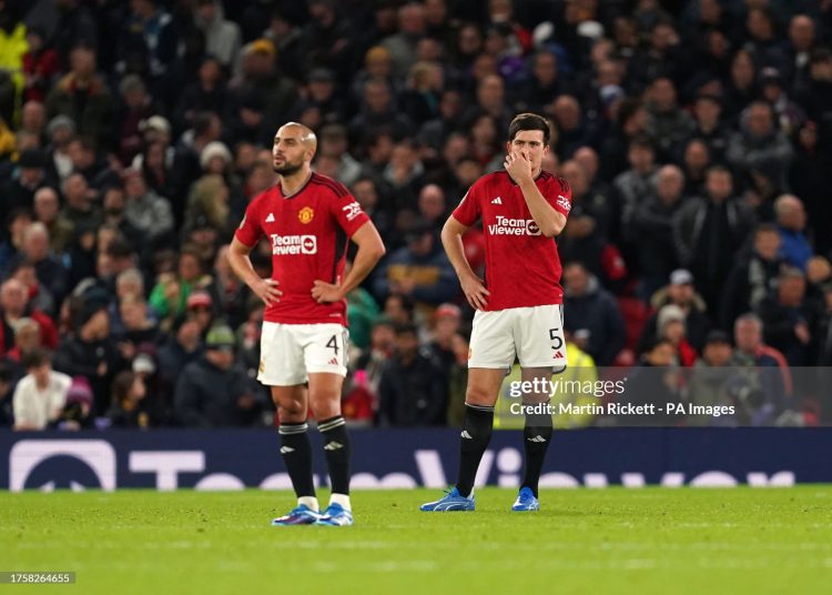 Manchester United's Sofyan Amrabat and Harry Maguire react after 0-3 loss to Newcastle (Photo by Martin Rickett/PA Images via Getty Images)