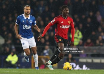 Kobbie Mainoo of Manchester United in action with Dominic Calvert-Lewin of Everton (Photo by Matthew Peters/Manchester United via Getty Images)