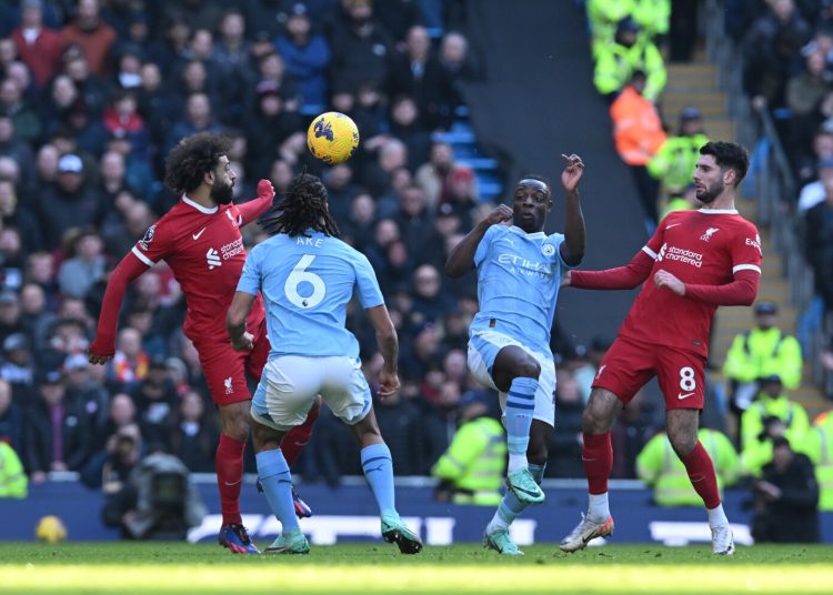 MANCHESTER, ENGLAND - NOVEMBER 25: (THE SUN OUT. THE SUN ON SUNDAY OUT)Mohamed Salah and Dominik Szoboszlai of Liverpool in actionduring the Premier League match between Manchester City and Liverpool FC at Etihad Stadium on November 25, 2023 in Manchester, England. (Photo by John Powell/Liverpool FC via Getty Images)