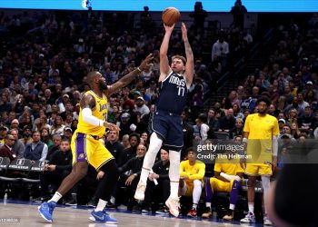 Luka Doncic #77 of the Dallas Mavericks shoots the ball against LeBron James #23 of the Los Angeles Lakers (Photo by Tim Heitman/Getty Images)