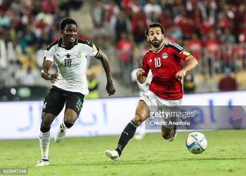 Mohamed Salah (R) of Egypt in action against Daniel Amartey (L) of Ghana (Photo by Ibrahim Ramadan/Anadolu Agency/Getty Images)