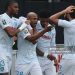 Le Havre's Ghanaian forward #28 Andre Ayew (2ndL) is congratulated by his teammates (Photo by FRED TANNEAU/AFP via Getty Images)