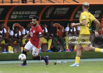 Muhammed Salah (L) of Egypt in action against Guima of Mozambique. (Photo by Yvan Gabon/Anadolu via Getty Images)