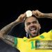 Dani Alves #13 of Team Brazil celebrates with their gold medal Tokyo 2020 Olympic Games (Photo by Alexander Hassenstein/Getty Images)