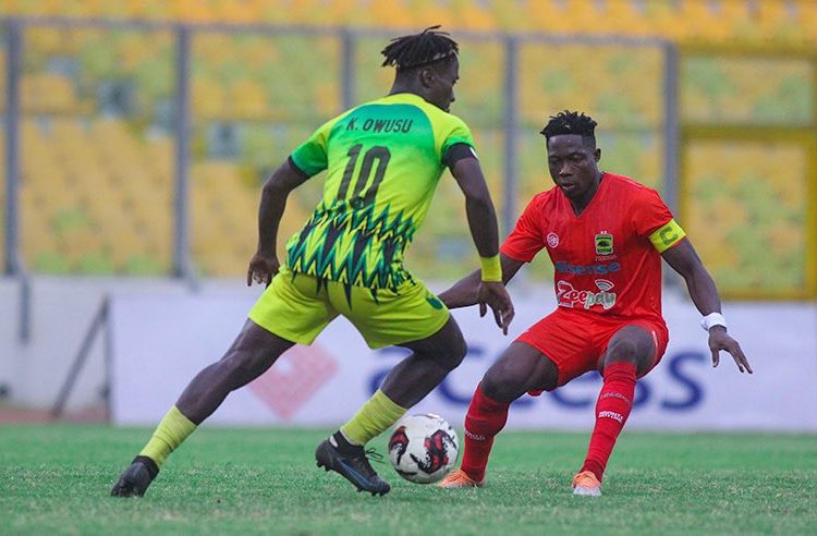 Kotoko's Justice Blay (red) v Gold Stars but missed the Dreams FC tie to injury Photo Courtesy: Kumasi Asante Kotoko SC
