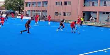 Ghana in action against Kenya (red) at 13th African Games
