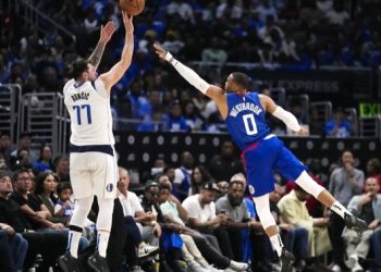 Doncic attempts shot over Russell Westbrook Photo Courtesy: AP