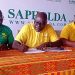 Greater Accra Hockey Association Vice Chairman Derrick Tamakloe (middle right) and Head of Sales and Marketing for Sapholda Ventures Ebo Acquaye (middle left) sign sponsorship documents.
