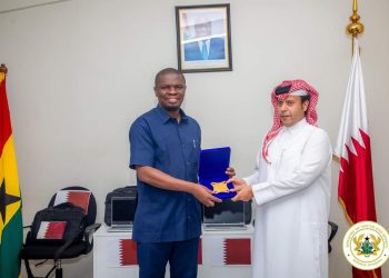 Sports Minister Mustapha Ussif receives items from Ambassador of Qatar to Ghana representative