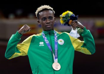 Men’s Feather (52-57kg) bronze medalist Samuel Takyi of Ghana poses with his medal (Photo by Ueslei Marcelino - Pool/Getty Images)