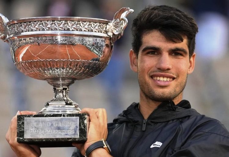 Carlos Alcaraz with 2024 French Open title Photo Courtesy: AP