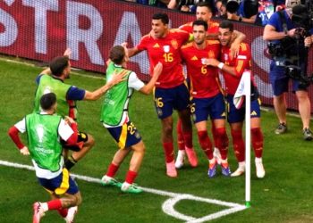 Spain celebrate goal against Germany Photo Courtesy: AP