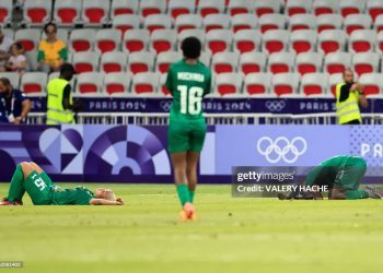 TOPSHOT - Zambia players reacts after their defeat in the women's group B football match between Australia and Zambia during the Paris 2024 Olympic Games at the Nice Stadium in Nice on July 28, 2024. (Photo by Valery HACHE / AFP) (Photo by VALERY HACHE/AFP via Getty Images)