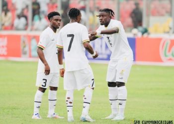 Black Stars players Fatawu Issahaku (7), Tariq Lamptey (3), Mohammed Salisu in action against Angola