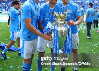John Stones of Manchester City (L), Rodri of Manchester City (C) and Ruben Dias of Manchester City (Photo by Simon Stacpoole/Offside/Offside via Getty Images)