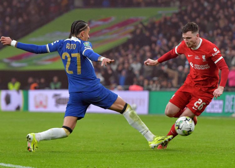 Andrew Robertson is looking to beat Malo Gusto during the Carabao Cup Final between Chelsea and Liverpool at Wembley Stadium in London, on February 25, 2024. (Photo by MI News/NurPhoto) (Photo by MI News / NurPhoto / NurPhoto via AFP)