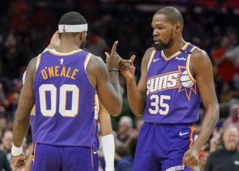 Kevin Durant celebrates with Royce O'Neale Photo Courtesy: AP