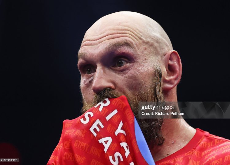 Tyson Fury reacts following defeat in the IBF, IBO, WBA, WBC and WBO Undisputed World Heavyweight titles' fight (Photo by Richard Pelham/Getty Images)