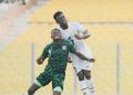 Ghana defender Isaac Afful in action against Nigeria