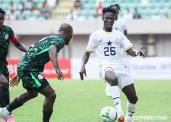 Manuel Mantey of Ghana (26) in action against Nigeria