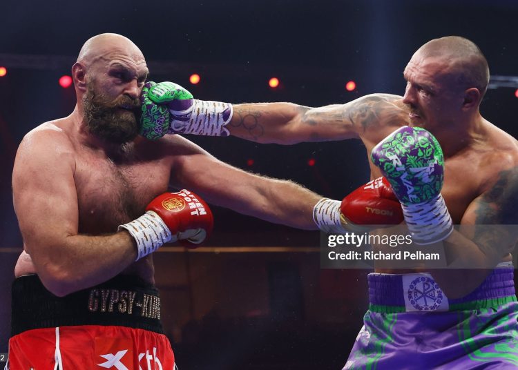 Oleksandr Usyk punches Tyson Fury (Photo by Richard Pelham/Getty Images)
