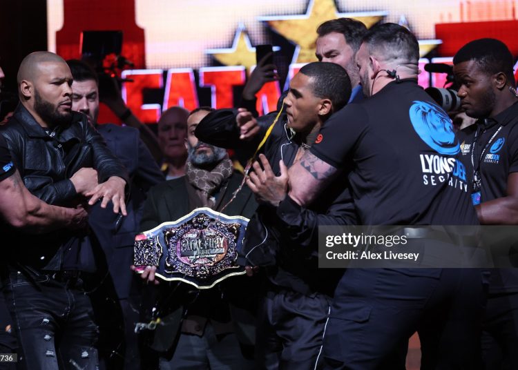 Conor Benn (R) is held back after Chris Eubank Jr (L) throws an egg at him during a press conference conference ahead of their fight (Photo by Alex Livesey/Getty Images)