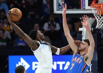 Anthony Edwards dunks over Chet Holmgren Photo Courtesy: Getty Images