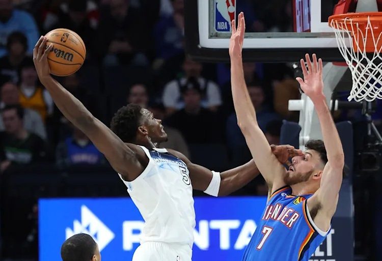 Anthony Edwards dunks over Chet Holmgren Photo Courtesy: Getty Images