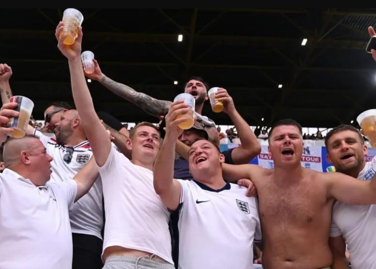 Shot of Football Fans with alcoholic drinks Photo Courtesy: Getty Images