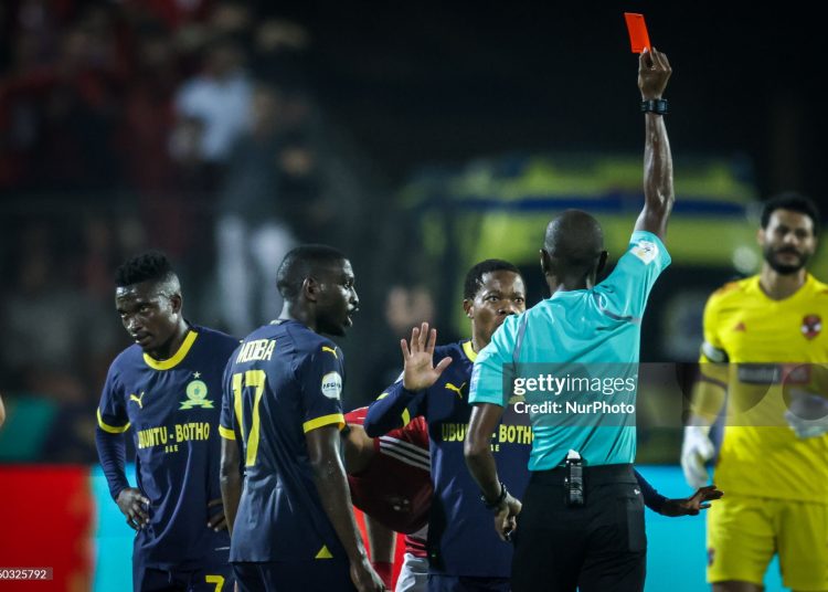 Referee Issa Sy gives red card  (Photo by Ayman Aref/NurPhoto via Getty Images)