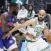 Tim Hardaway Jr. guards Derrick White Photo Courtesy: AP