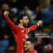 Goalscorer Bruno Fernandes of Manchester United is held aloft by Diogo Dalot during the Premier League match between Leicester City FC and Manchester United FC (Photo by Malcolm Couzens/Getty Images)